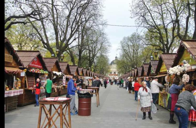 AN OPEN market in Lviv sells local products (photo credit: SETH J. FRANTZMAN)