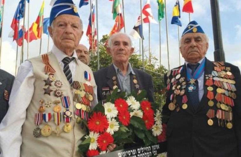 Jewish veterans of WWII are honored in May 2014 at Yad Vashem in Jerusalem (photo credit: SAM SOKOL)