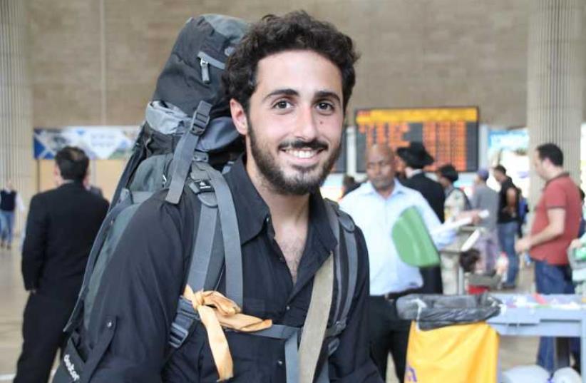 Omri Kadoch at Ben Gurion International Airport on Sunday, right after he landed from Nepal (photo credit: TOVAH LAZAROFF)