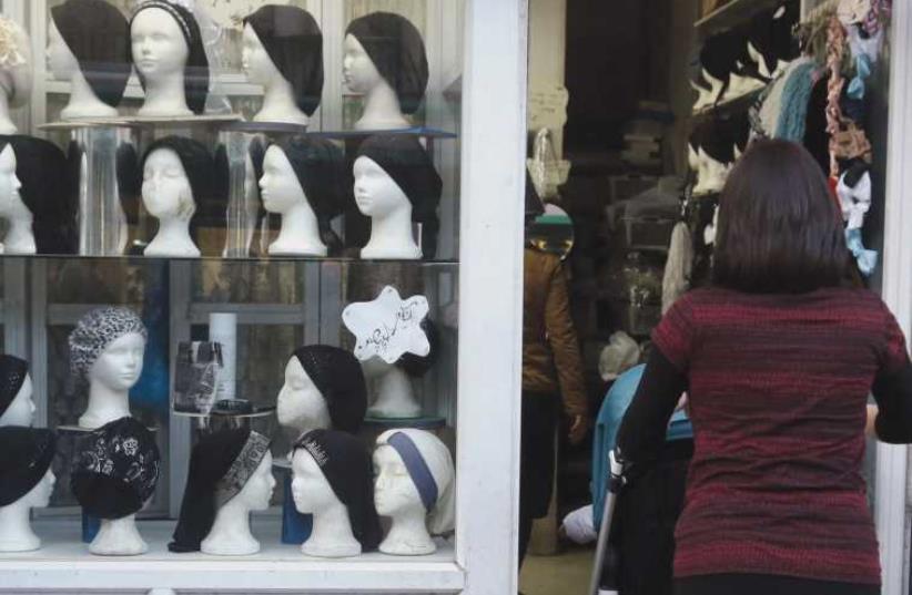 A hair-covering store in Jerusalem. (photo credit: MARC ISRAEL SELLEM/THE JERUSALEM POST)
