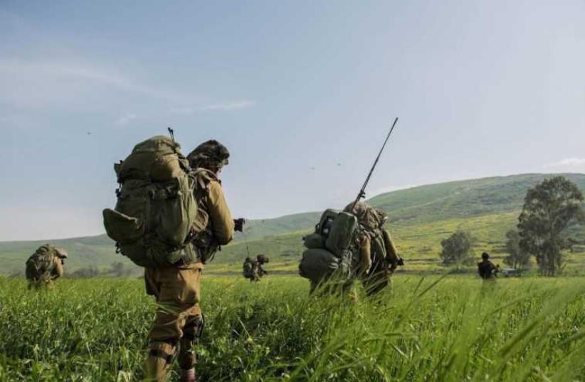 Members of the Kfir Infantry Brigade on combat training maneuvers in the Golan Heights recently (photo credit: IDF SPOKESPERSON'S UNIT)