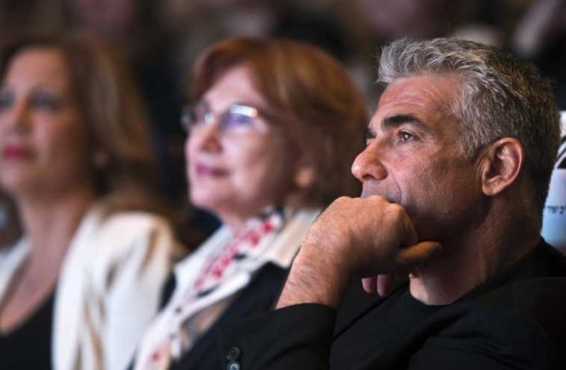 Yesh Atid leader Yair Lapid attends a women's committee convention in Tel Aviv (photo credit: REUTERS)