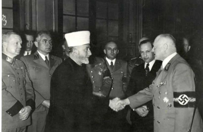 Amin al-Husseini, the mufti of Jerusalem, meets German Foreign Minister Joachim von Ribbentrop in Berlin, November 20, 1941. (photo credit: JEWISH AGENCY)