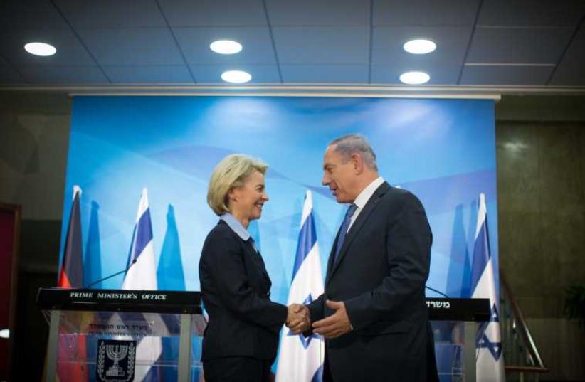 PM Netanyahu and German Defence Minister (photo credit: TALI MAYER)