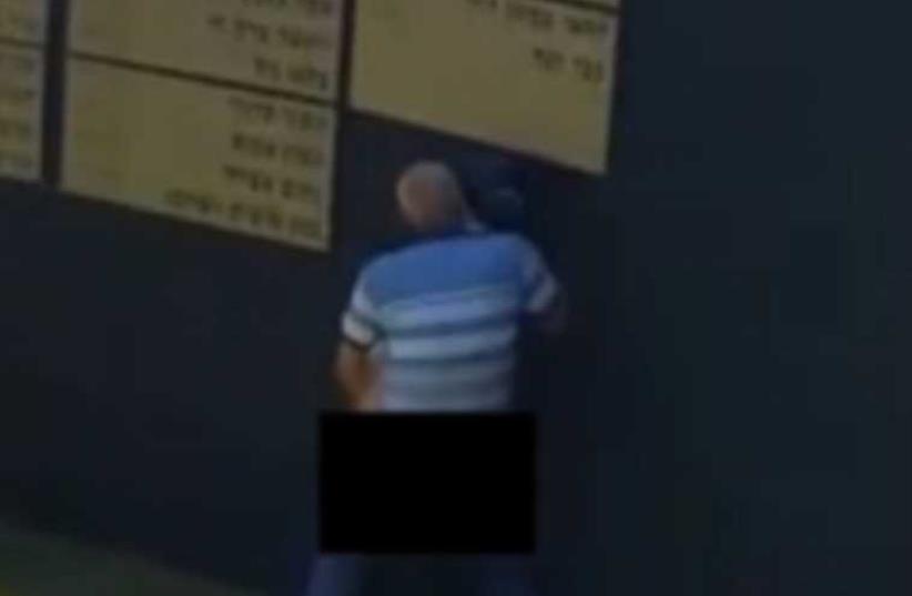 Couple engaged in a sex act at IDF soldier memorial (photo credit: screenshot)