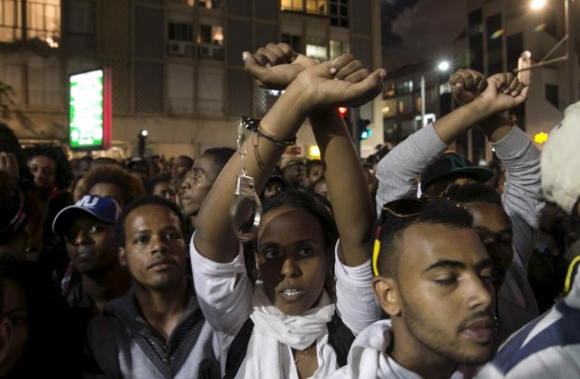 Ethiopian Israelis take part in a protest in Tel Aviv on May 3 against police racism and brutality (photo credit: REUTERS)