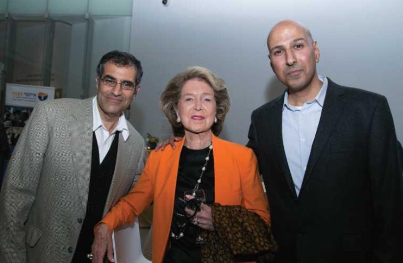 Nina Weiner, co-founder and president of ISEF, poses with ISEF executive director Tomer Samarkandi (right) and chairman of the ISEF executive committee, Prof. Eli Avraham, at a donor event in May (photo credit: OFER AMRAM)