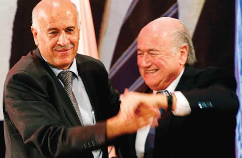 Palestinian Football Association President Jibril Rajoub (L) and FIFA President Sepp Blatter (photo credit: REUTERS)