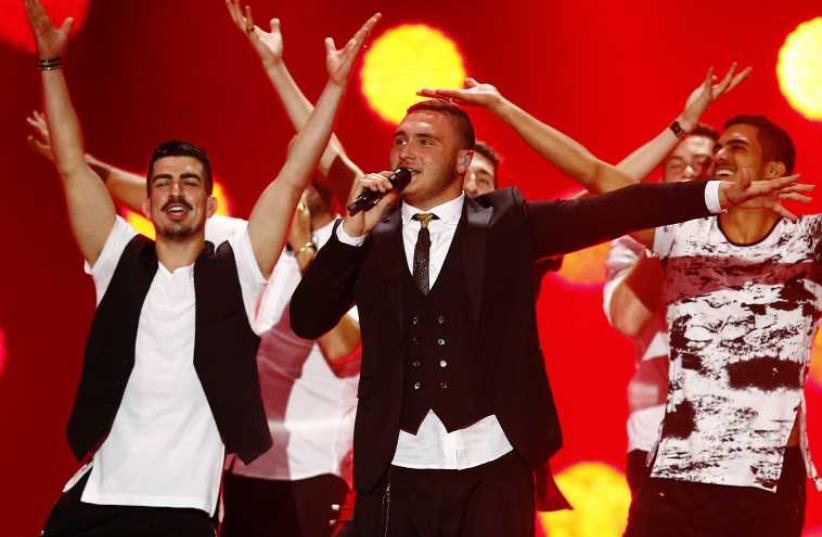 Nadav Guedj representing Israel performs during a dress rehearsal for the second semifinal of the upcoming 60th annual Eurovision Song Contest in Vienna (photo credit: REUTERS)