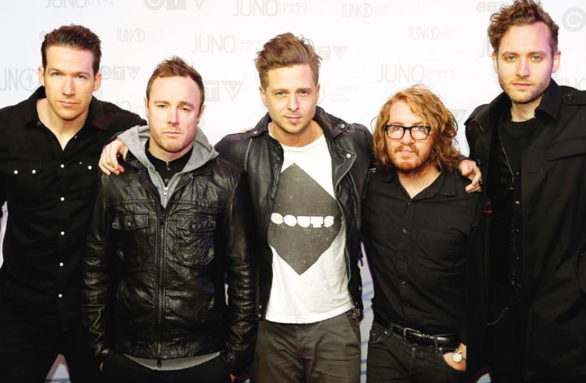 ONE REPUBLIC appears on a red carpet in Canada last year (photo credit: REUTERS)
