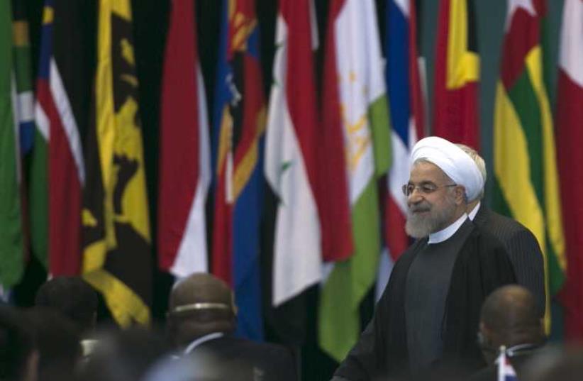 Iran's President Hassan Rouhani arrives to attend the closing statement for the Asian-African Conference in Jakarta April 23, 2015.  (photo credit: REUTERS)