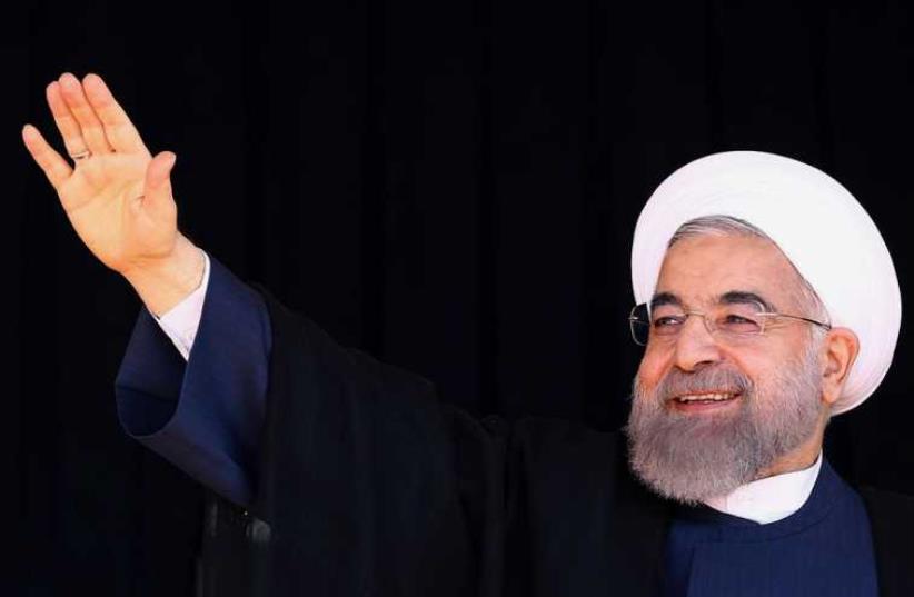 Iranian President Hassan Rouhani (photo credit: HO / IRANIAN PRESIDENCY WEBSITE / AFP)