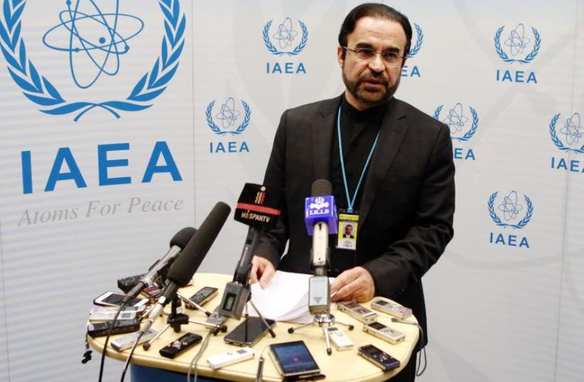 Iran's ambassador to the IAEA Reza Najafi addresses the media after a board of governors meeting at the body's headquarters in Vienna March 4, 2015. (photo credit: REUTERS)