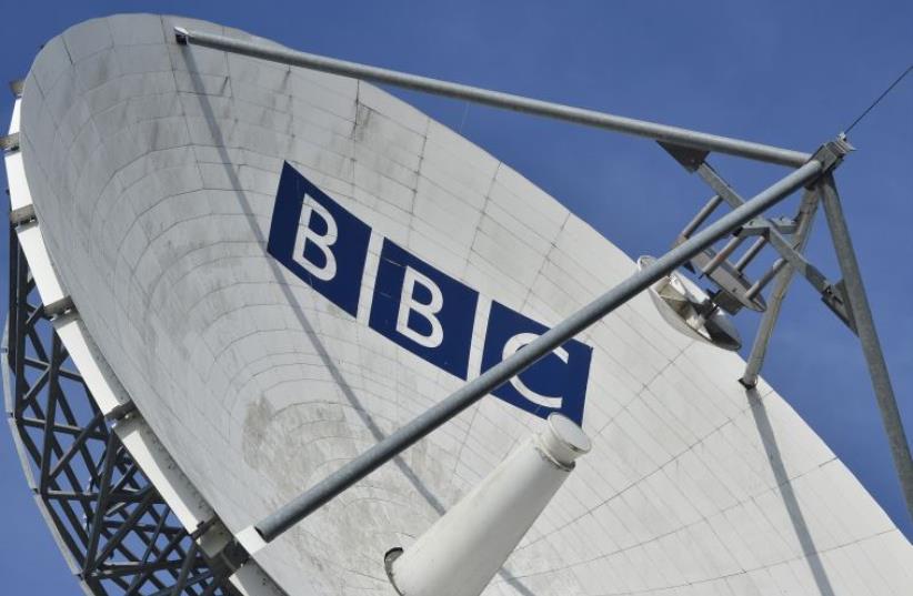 A satellite transmission dish is seen near BBC Television Center at White City in London (photo credit: REUTERS)