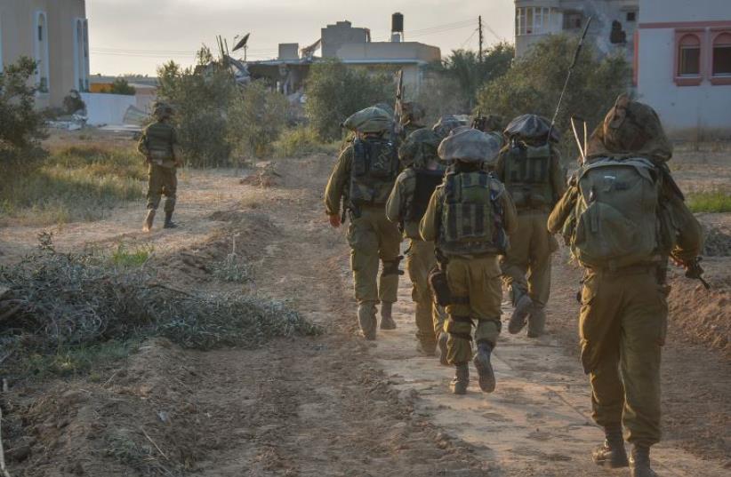 IDF FORCES operate inside the Gaza Strip during Operation Protective Edge (photo credit: IDF SPOKESMAN’S UNIT)