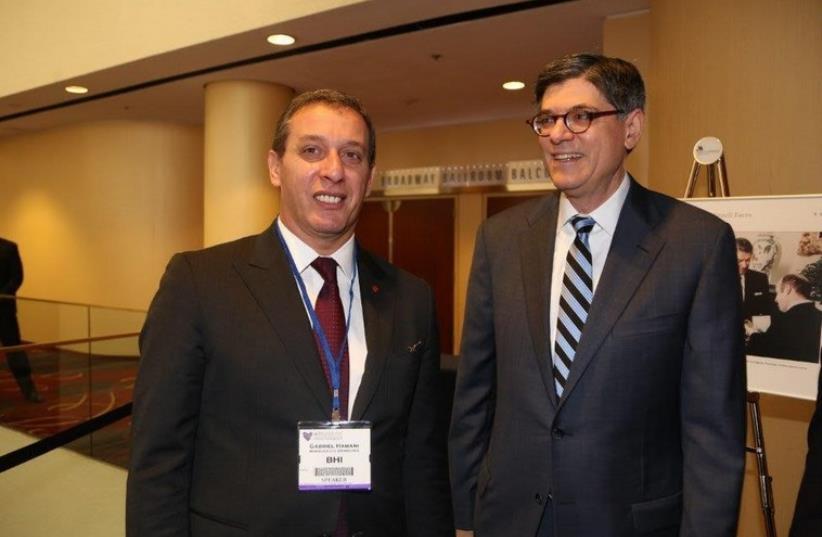 Gabriel Hamani , the manager of Bank Hapoalim branches in the US, meets with US Treasury Secretary Jacob Lew at the Jerusalem Post Conference in New York (photo credit: SIVAN FARAG)
