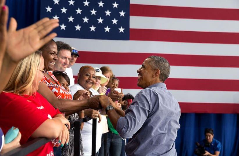 US President Barack Obama greets supporters in Milwaukee (photo credit: OFFICIAL WHITE HOUSE PHOTO / PETE SOUZA)