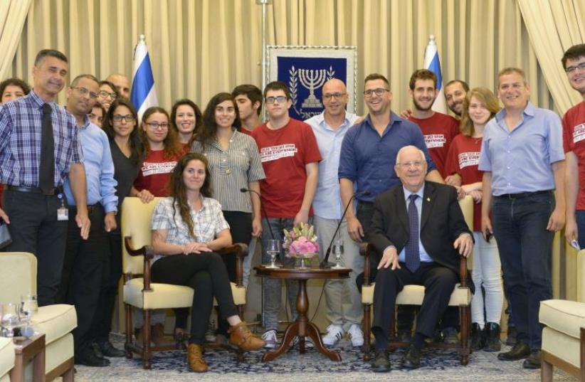 President Reuven Rivlin meets with gay youths at his residence in Jerusalem (photo credit: MARK NEYMAN / GPO)