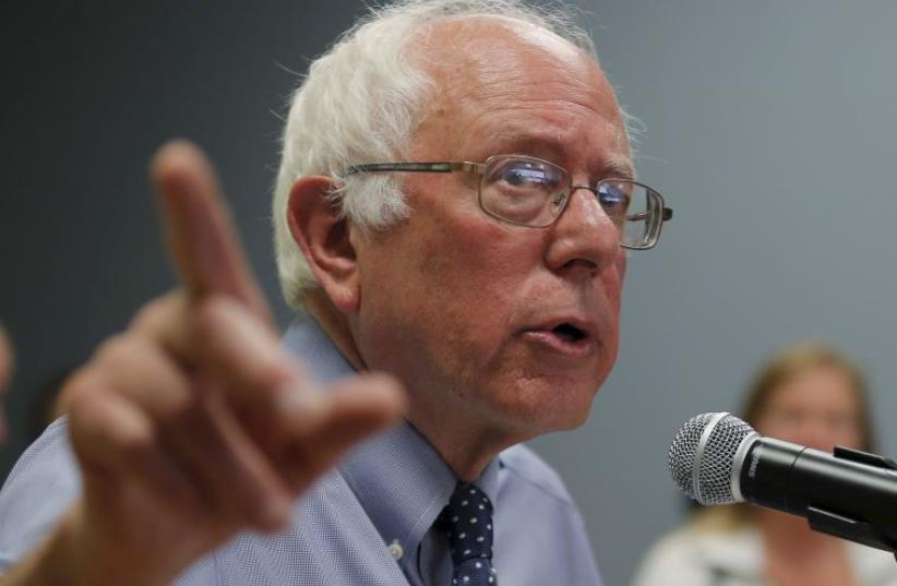 Democratic presidential candidate and US Senator Bernie Sanders (I-VT) speaks during a town-hall campaign stop at New England College in Concord, New Hampshire (photo credit: REUTERS)