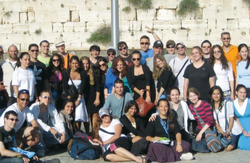 A Taglit-Birthright group, part of the OU ‘Israel Free Spirit’ program, visits the Western Wall. (photo credit: OU ISRAEL)