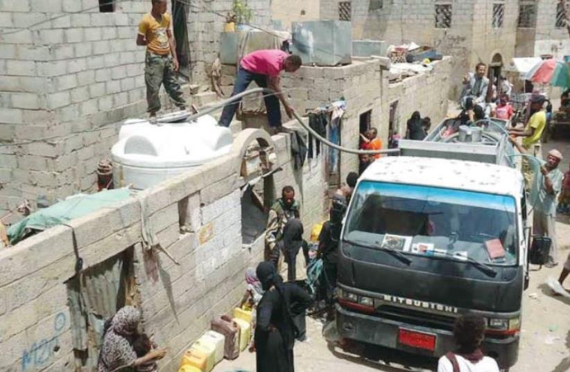 Water in Yemen is distributed to residents but is in short supply. (photo credit: THE MEDIA LINE)