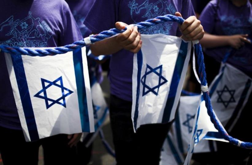 Participants in the 51st annual Israel parade in Manhattan, May 31 (photo credit: EDUARDO MUNOZ / REUTERS)