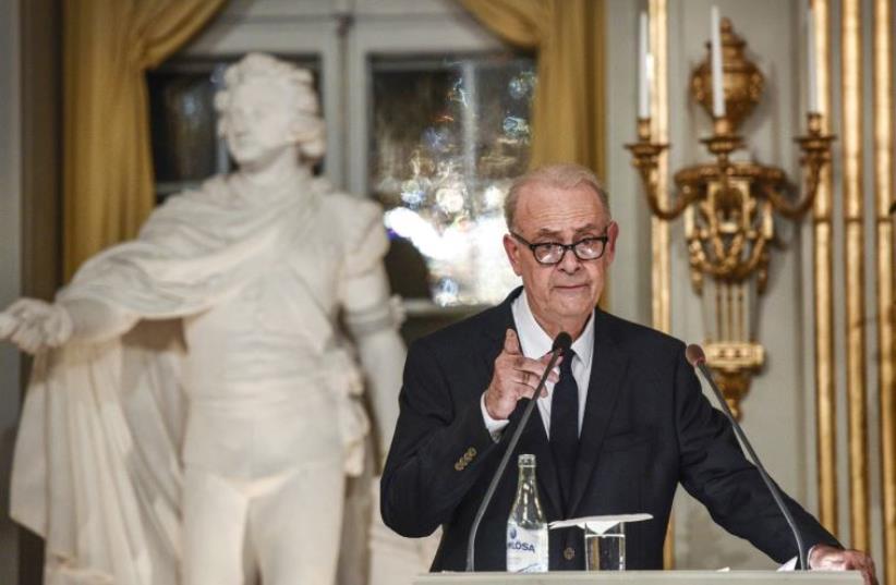Patrick Modiano delivers his Nobel lecture at the Swedish Academy in Stockholm, December 7 (photo credit: CHARLES PLATIAU / REUTERS)
