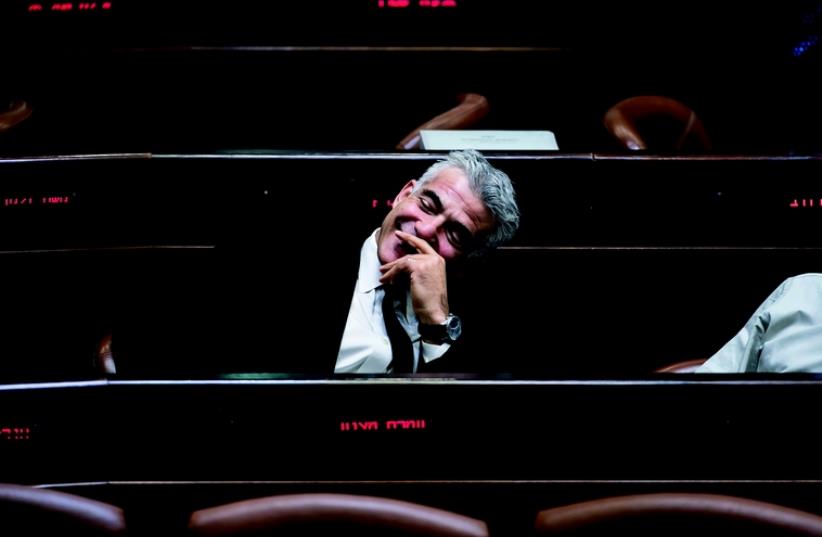 Yair Lapid à la Knesset (photo credit: REUTERS)