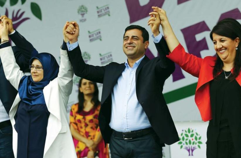The pro-Kurdish People’s Democratic Party (HDP) entered the parliament for the first time, exceeding the 10 percent threshold with 13.12% of the votes (photo credit: REUTERS)