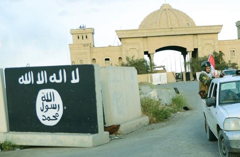 ISIS base (photo credit: REUTERS)