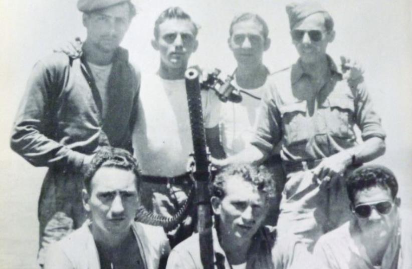 MENACHEM BEGIN (center) with crew members of the ‘Altalena.’ (photo credit: JABOTINSKY ARCHIVES)