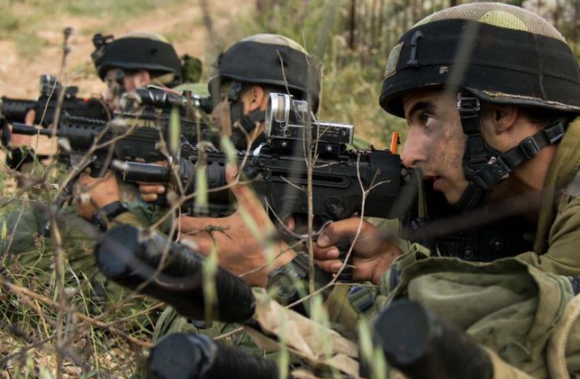 Soldiers with the IDF's Nahal reconnaissance battalion participate in drills (photo credit: IDF)