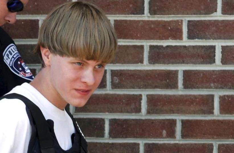Dylann Roof, suspected shooter of nine people at a Bible-study meeting in a historic African-American church in Charleston, South Carolina, in an attack US officials are investigating as a hate crime.  (photo credit: REUTERS)