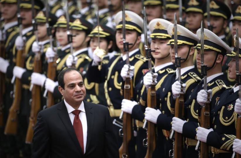 Egypt's President Abdel Fattah al-Sisi inspects honor guards in Beijing (photo credit: REUTERS)