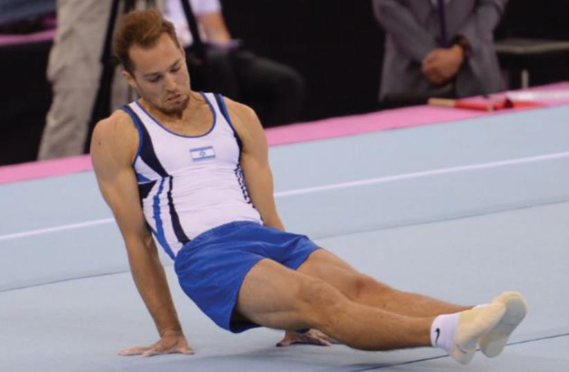 Israeli gymnast Alex Shatilov ended the floor final yesterday in fifth place. (photo credit: OLYMPIC COMMITTEE OF ISRAEL)