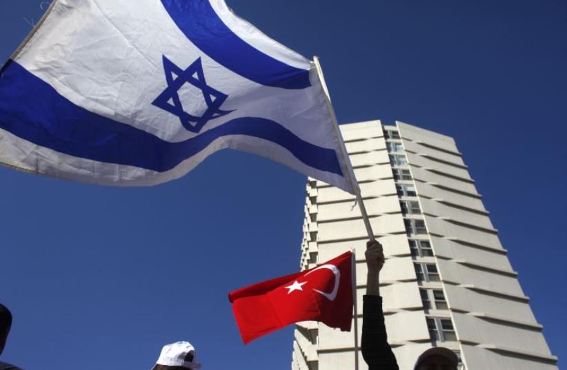 Israeli and Turkish flags [Illustrative] (photo credit: REUTERS)