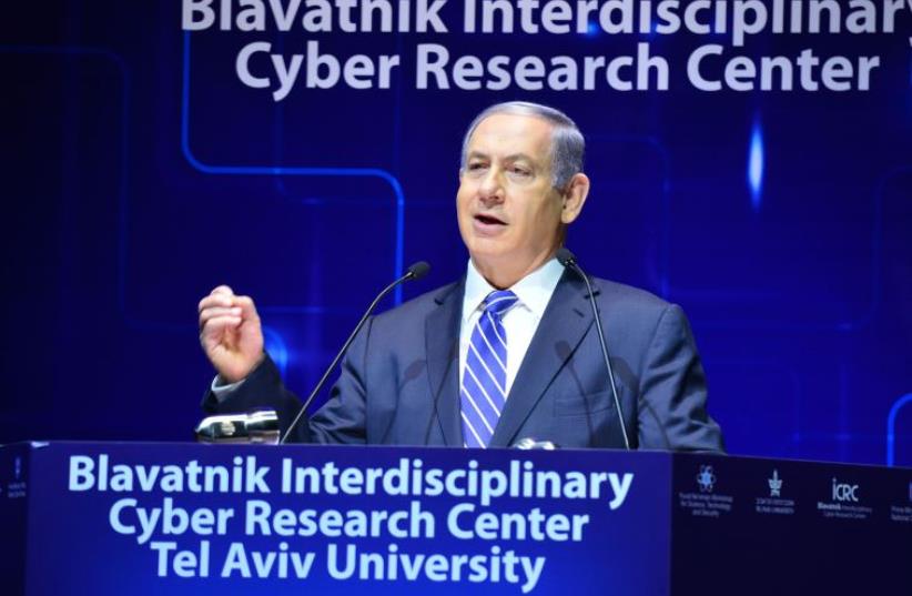 Prime Minister Benjamin Netanyahu addresses a cyber security conference at Tel Aviv University (photo credit: KOBI GIDEON/GPO)