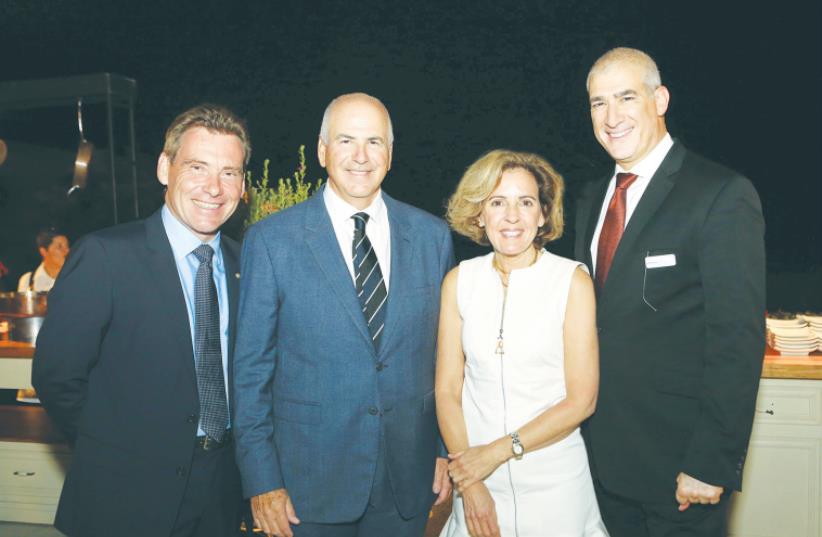 COMPANY EXECUTIVES attend the InterContinental Hotels Group conference opening ceremony in Tel Aviv earlier this week. From left: Didier Boidin, IHG’s vice president Europe for luxury and boutique hotels; Henry Taic, owner of the David InterContinental in Tel Aviv; Angela Brav, IHG’s regional CEO fo (photo credit: FABIAN KOLDORFF)
