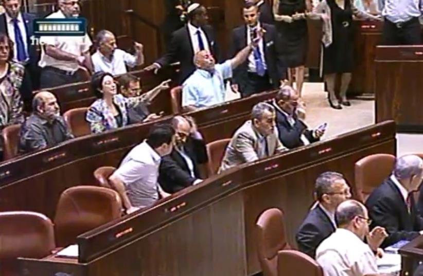 Israeli Knesset members arguing in parliament. (photo credit: KNESSET CHANNEL)