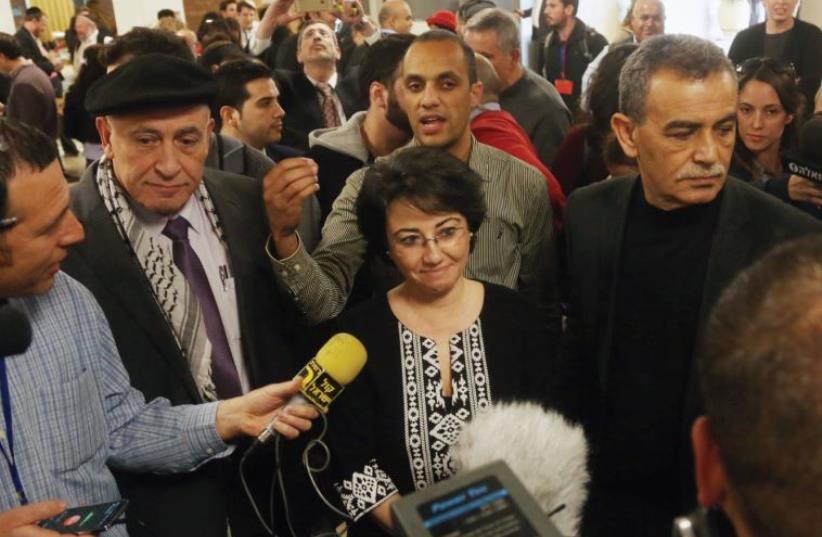 KNESSET MEMBER Haneen Zoabi speaking with the press last year. Her party colleague Basel Ghattas has decided to join the Gaza flotilla (photo credit: MARC ISRAEL SELLEM)