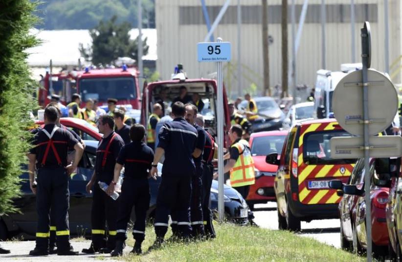 French Factory Attack (photo credit: PHILIPPE DESMAZES / AFP)