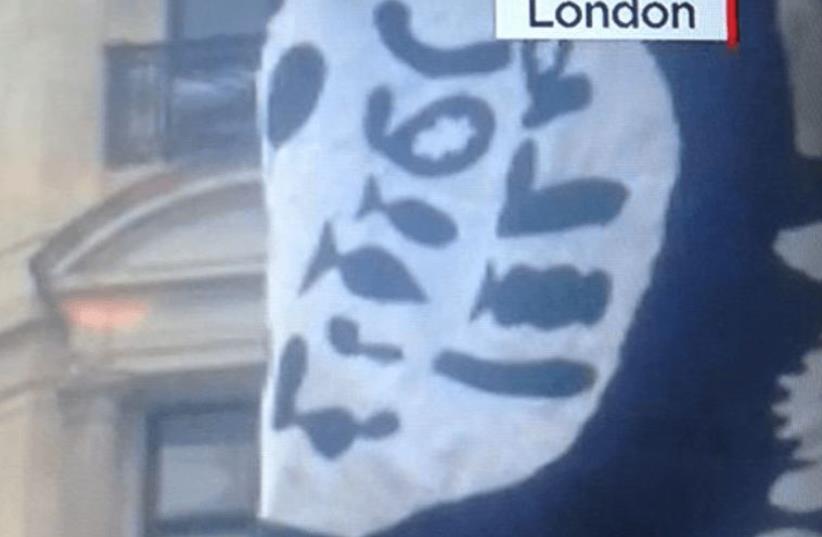 Satirical "ISIS flag" spotted at gay pride parade in London (photo credit: screenshot)
