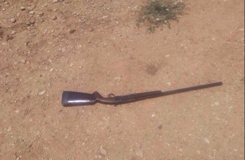 The rifle which was found on the assailant as she attempted to cross the border   (photo credit: MAARIV)