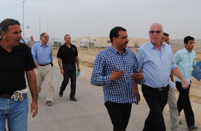 Hura Mayor Mohammed Alnabari (center) shows the new Agriculture Minister Uri Ariel around the town’s recently inaugurated Wadi Attir sustainable eco-farm project. (photo credit: COURTESY HURA MUNICIPALITY)