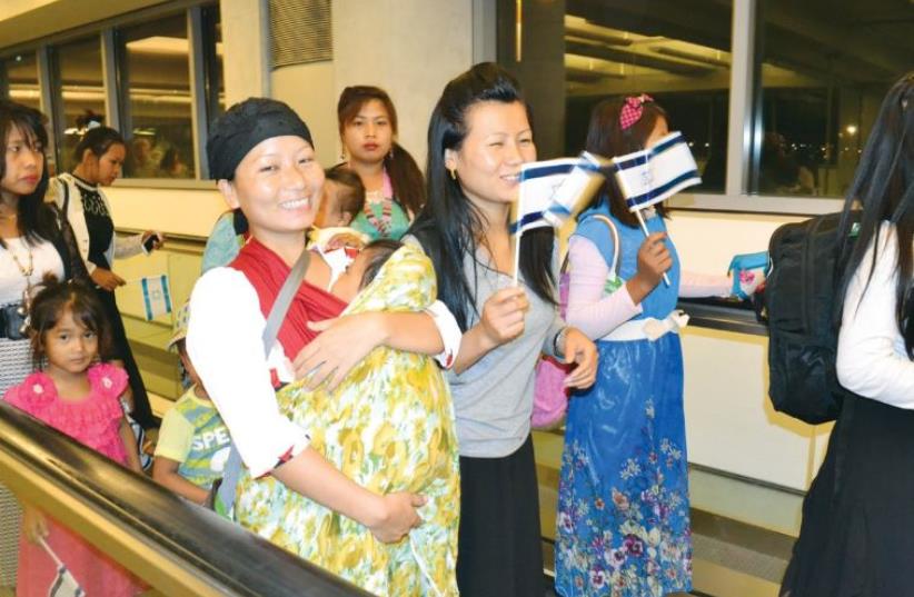 BNEI MENASHE immigrants arrive at Ben-Gurion Airport. (photo credit: LAURA KELLY)