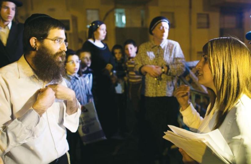 Ruth Colian, head of the first ultra-Orthodox Jewish women’s party Uvizchutan, campaigns in Beit Shemesh in March. (photo credit: RONEN ZVULUN / REUTERS)