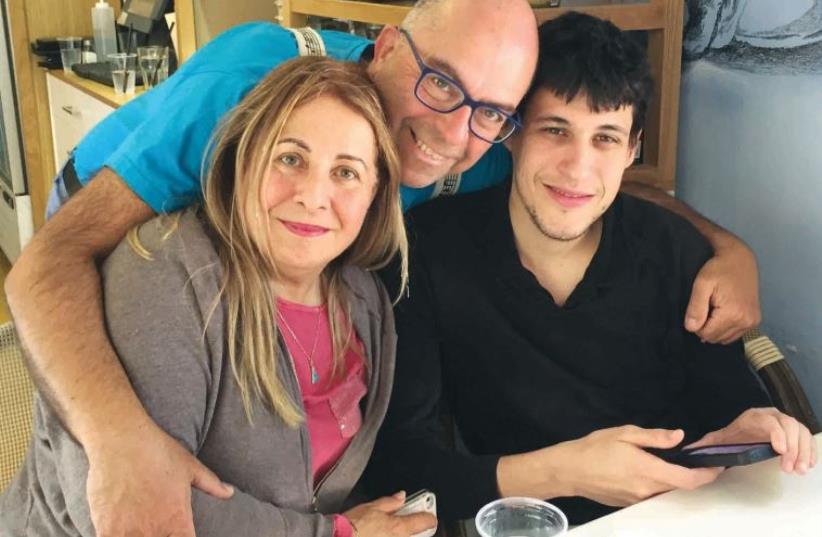 Prof. Mel Rosenberg (center) with his wife and Ourboox CEO Shuli Sapir-Nevo and cofounder and CTO Ran Shternin. (photo credit: Courtesy)