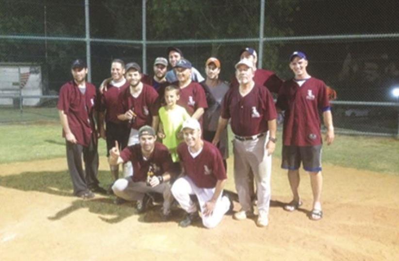 PHILIP STEIN’S SOX players pose on the field after their title-winning victory last week. (photo credit: Courtesy)