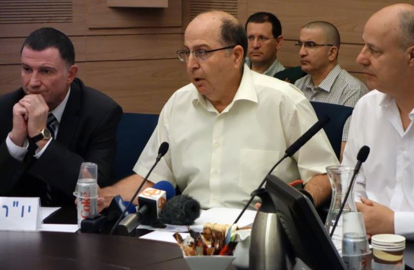 Defense Minister Moshe Ya'alon briefs Knesset Foreign Affairs and Defense Committee‏ (photo credit: ARIEL HERMONI / DEFENSE MINISTRY)