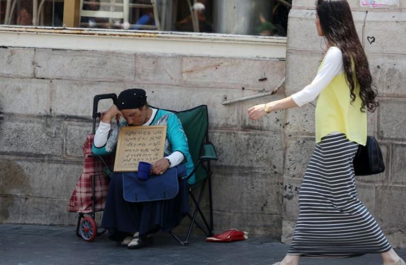 Beggar in Jerusalem (photo credit: MARC ISRAEL SELLEM/THE JERUSALEM POST)
